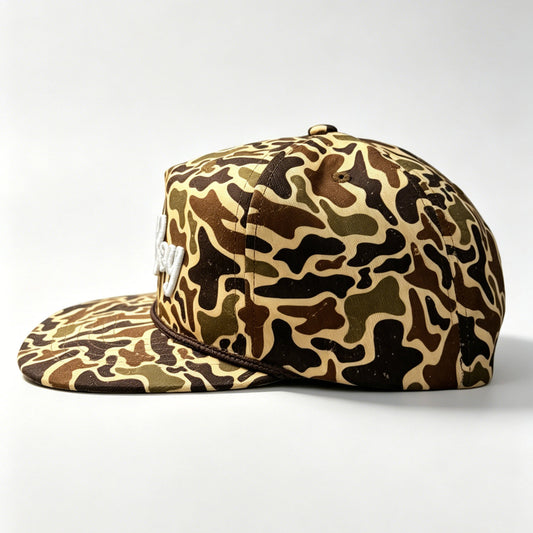 Camouflage-patterned cap on a white background