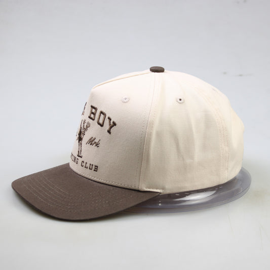 Beige and brown cap with text on a light gray background