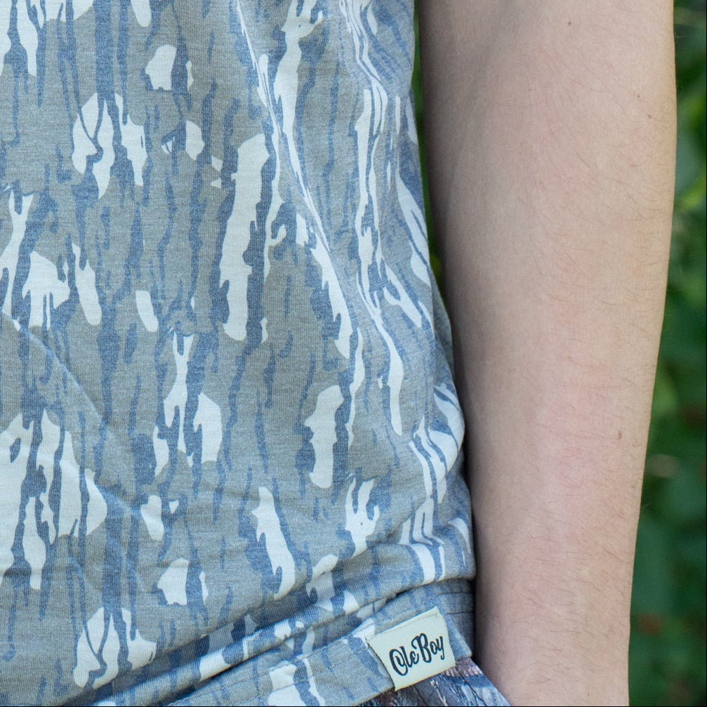 T-shirt with 'Ole Boy' text on a patterned background