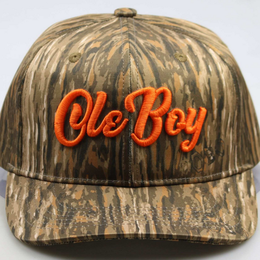 Camouflage cap with 'Ole Boy' embroidery on a white background