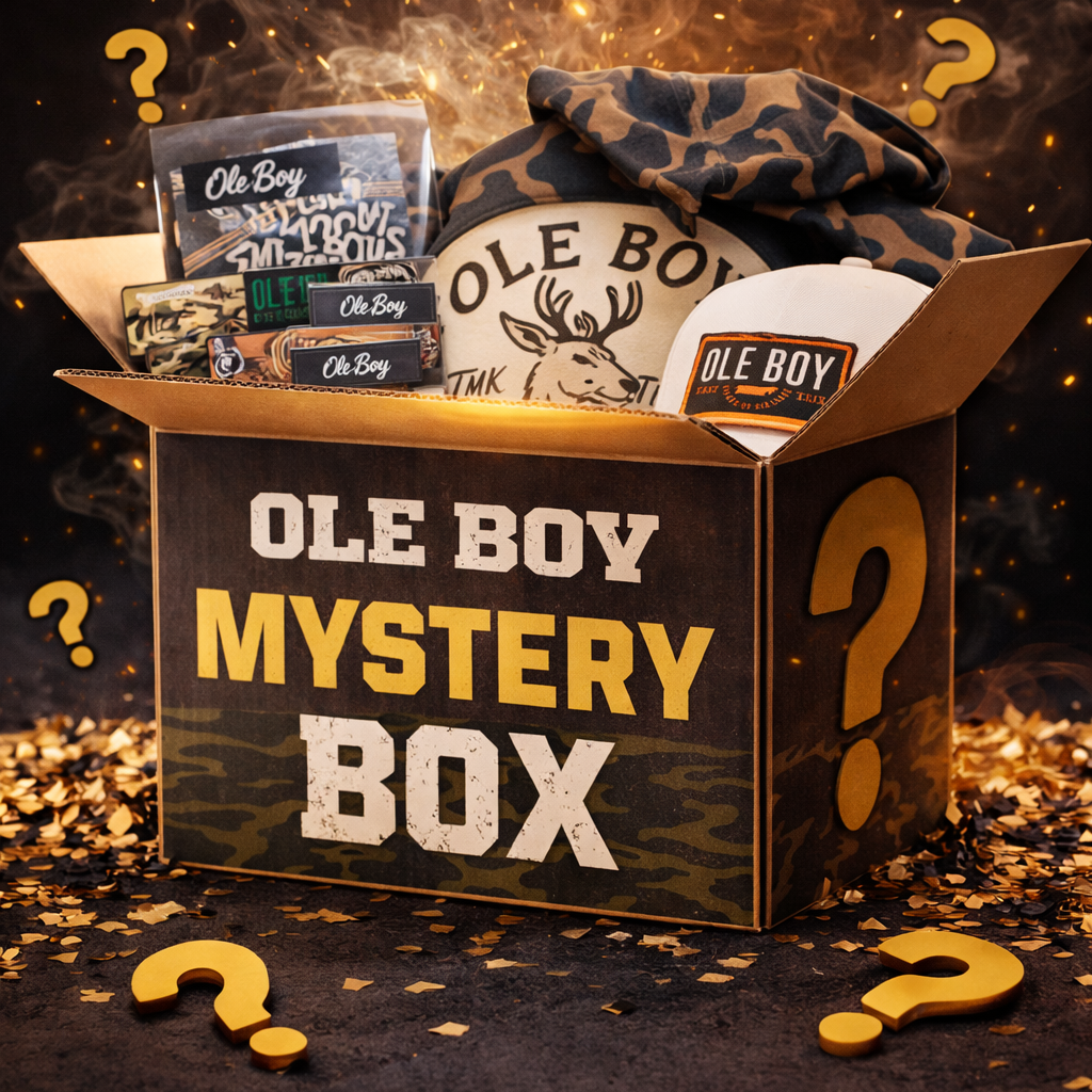 Ole Boy mystery box with various items on a dark background