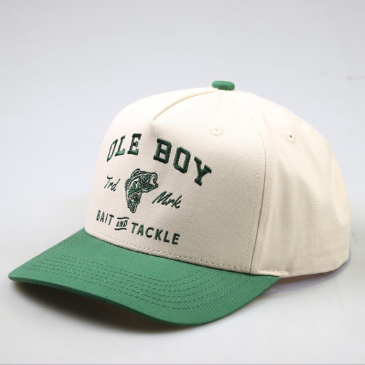 Beige and green cap with 'Ole Boy' branding on a light gray background