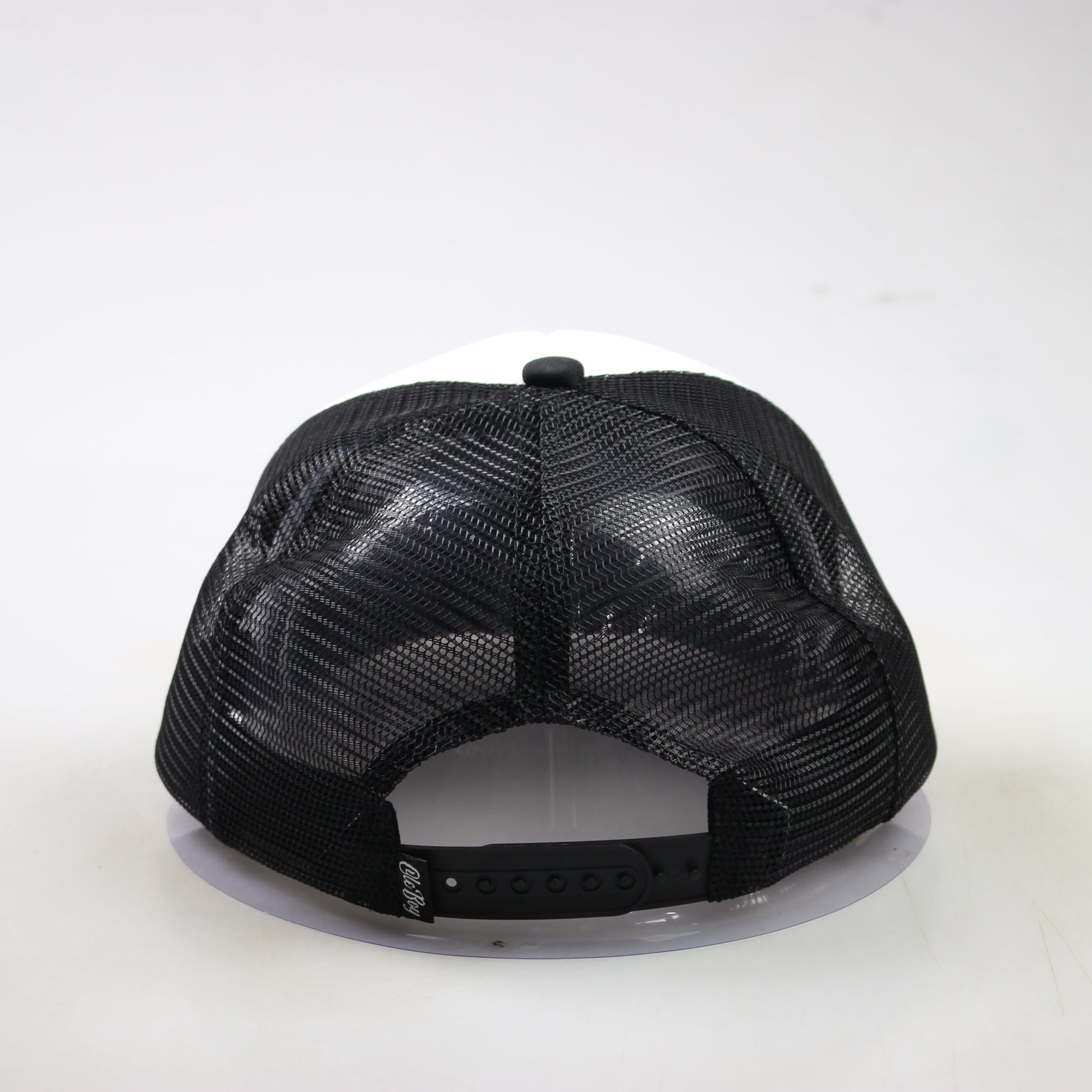 Black mesh cap on a white background