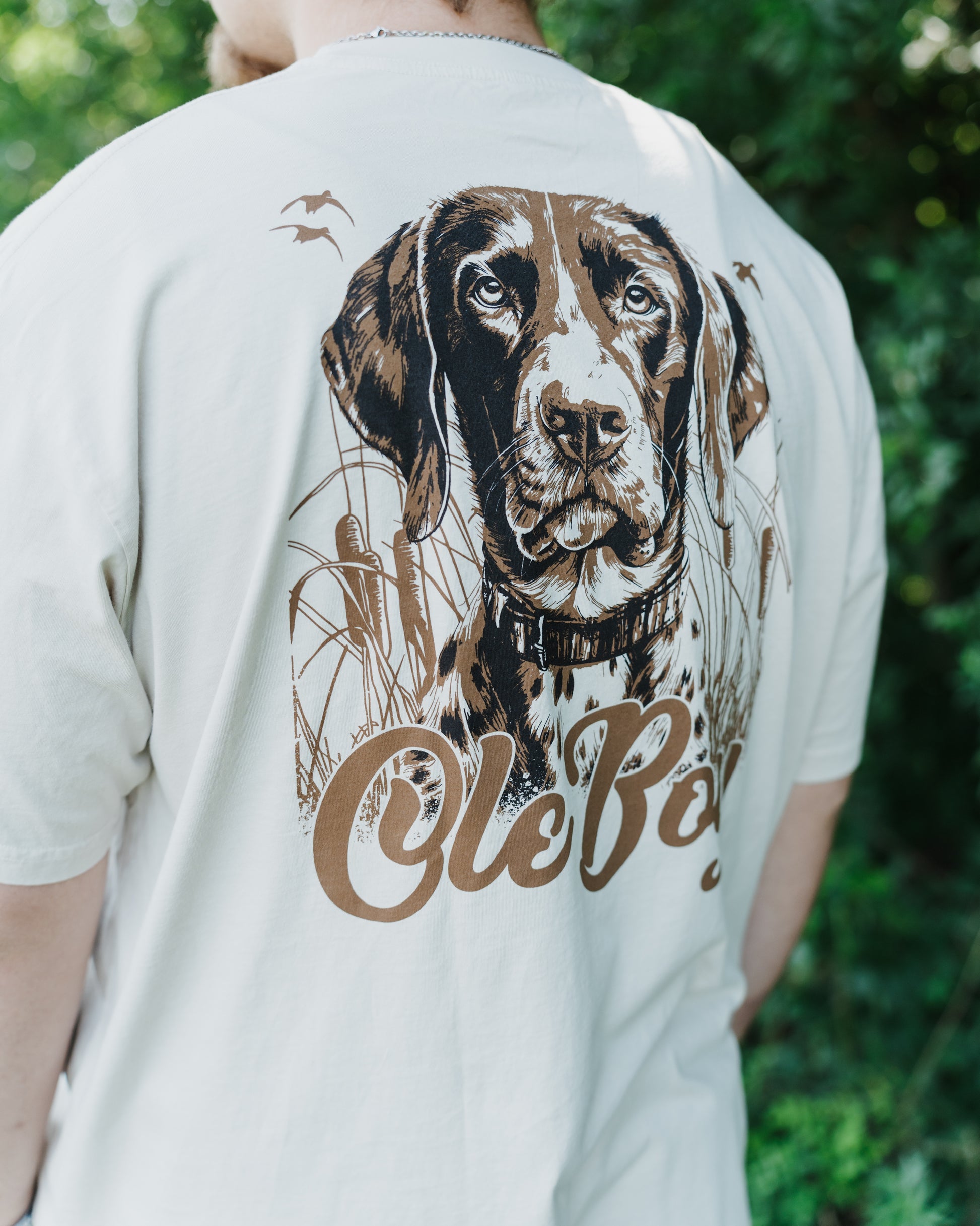 Person wearing a t-shirt with a GSP dog illustration and 'Ole Boy' text.