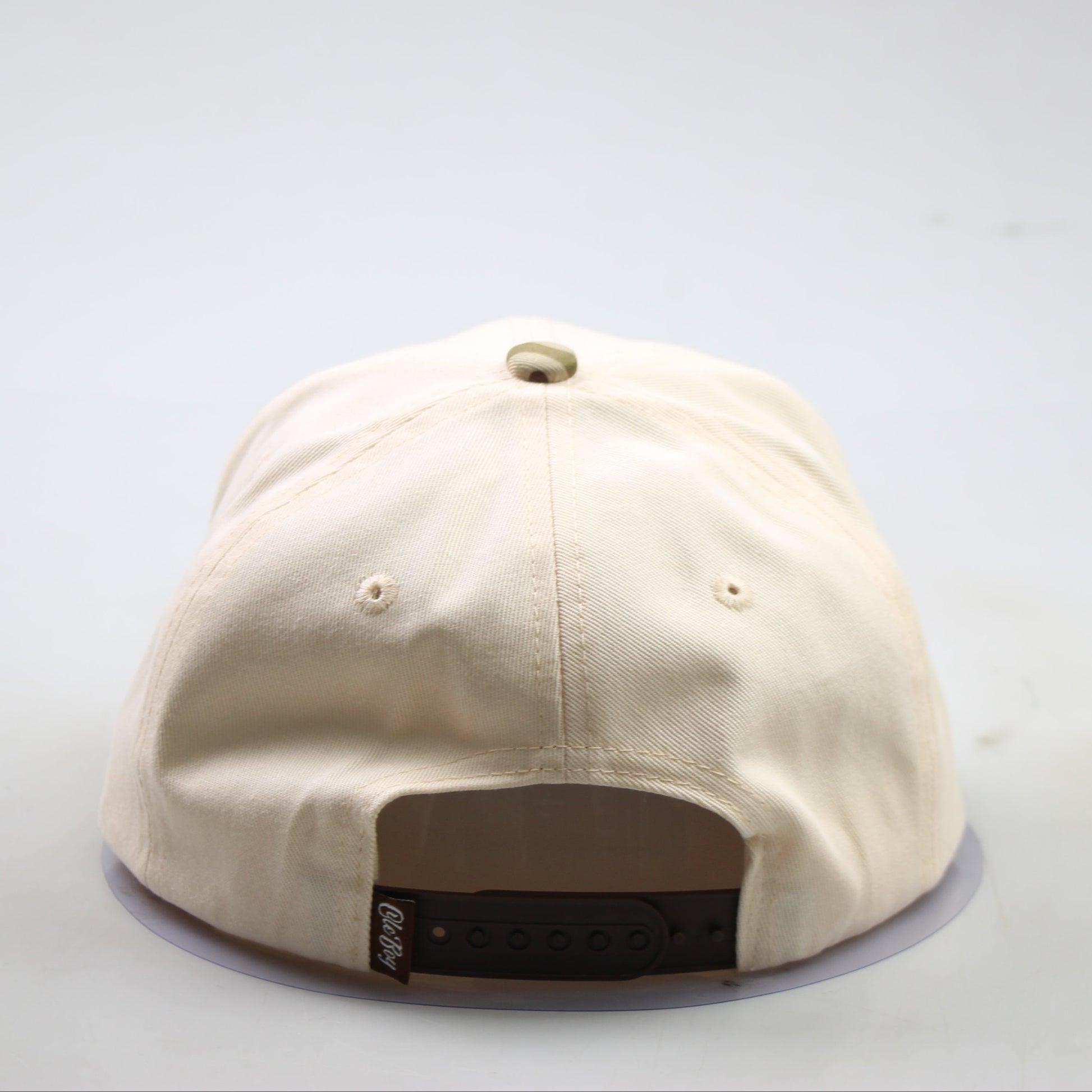 Beige cap on a white background