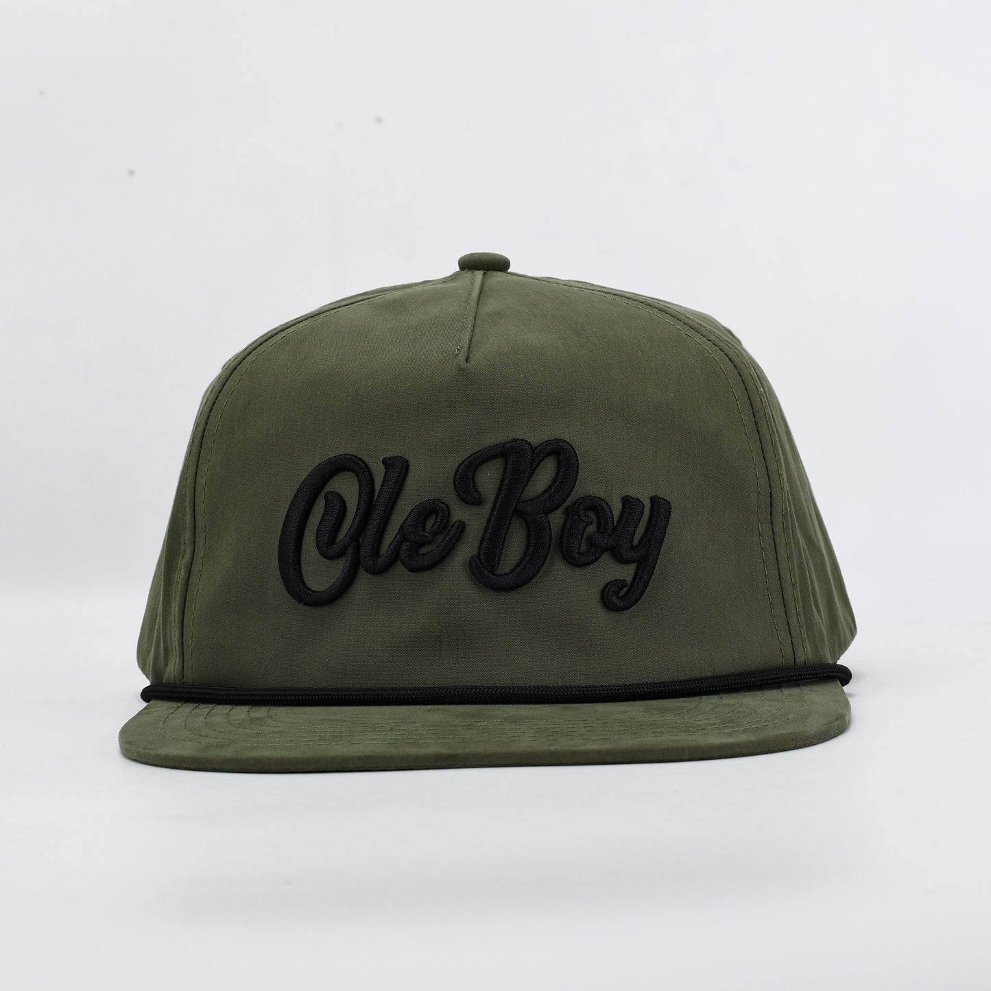 Green cap with 'Ole Boy' text on a white background
