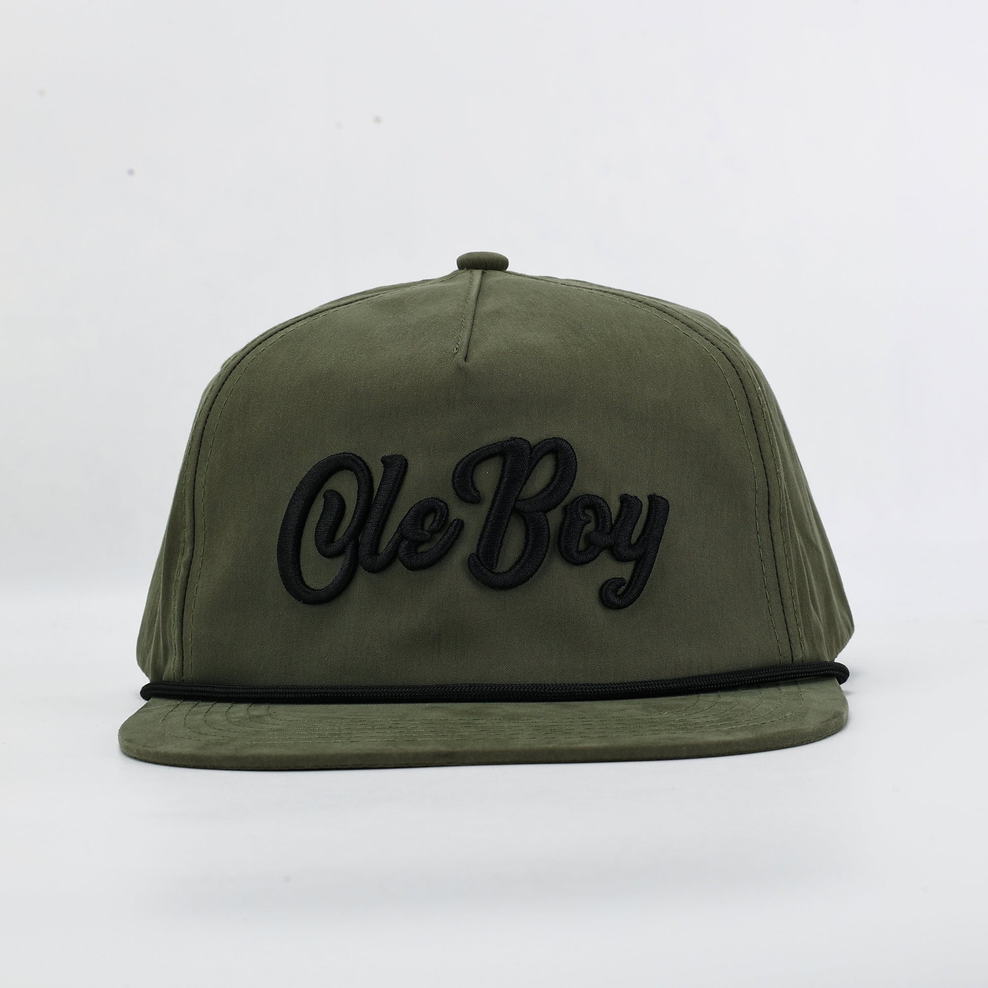 Green cap with 'Ole Boy' text on a white background