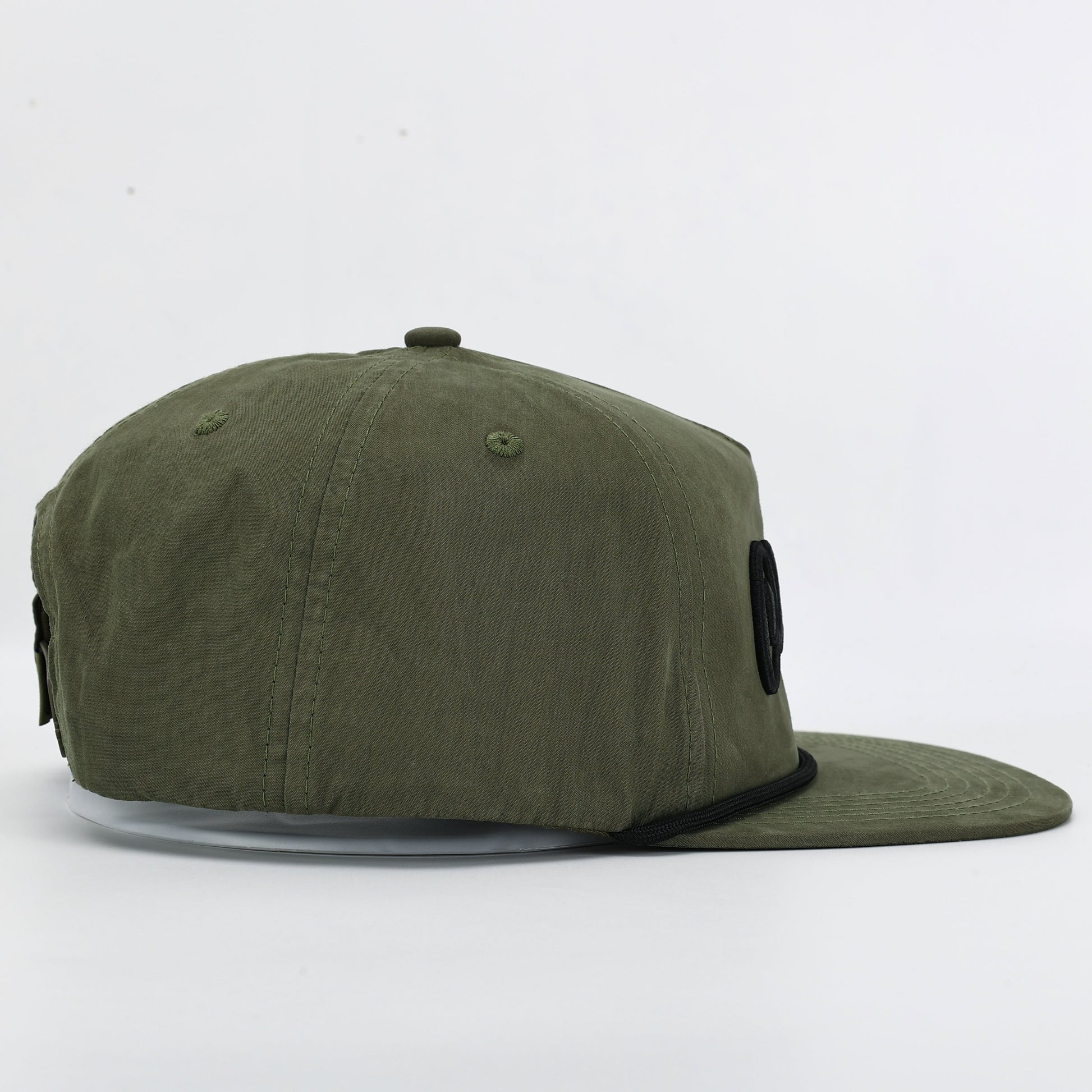 Green baseball cap on a white background