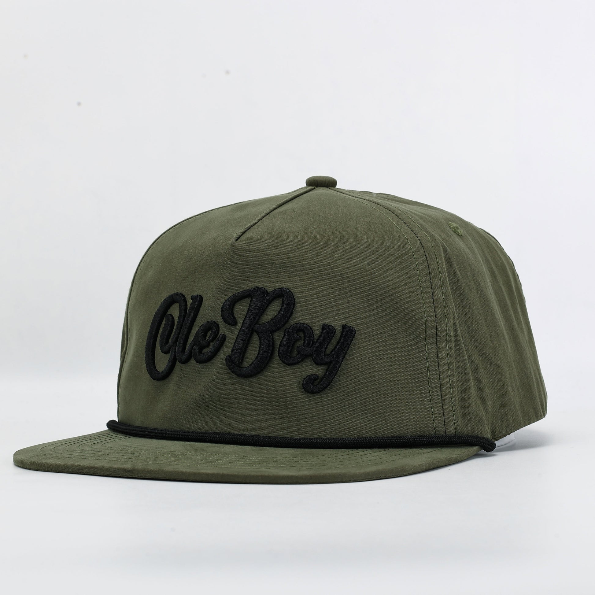 Green cap with 'Ole Boy' text on a white background