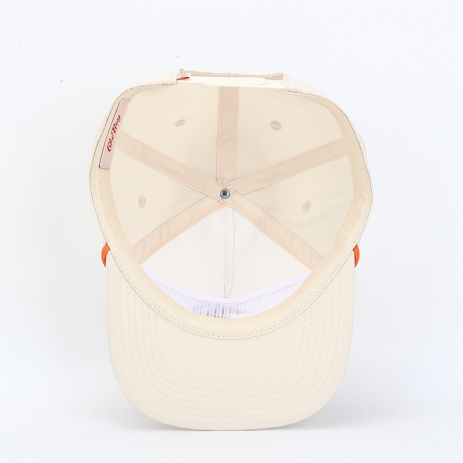 Beige baseball cap with orange accents on a white background