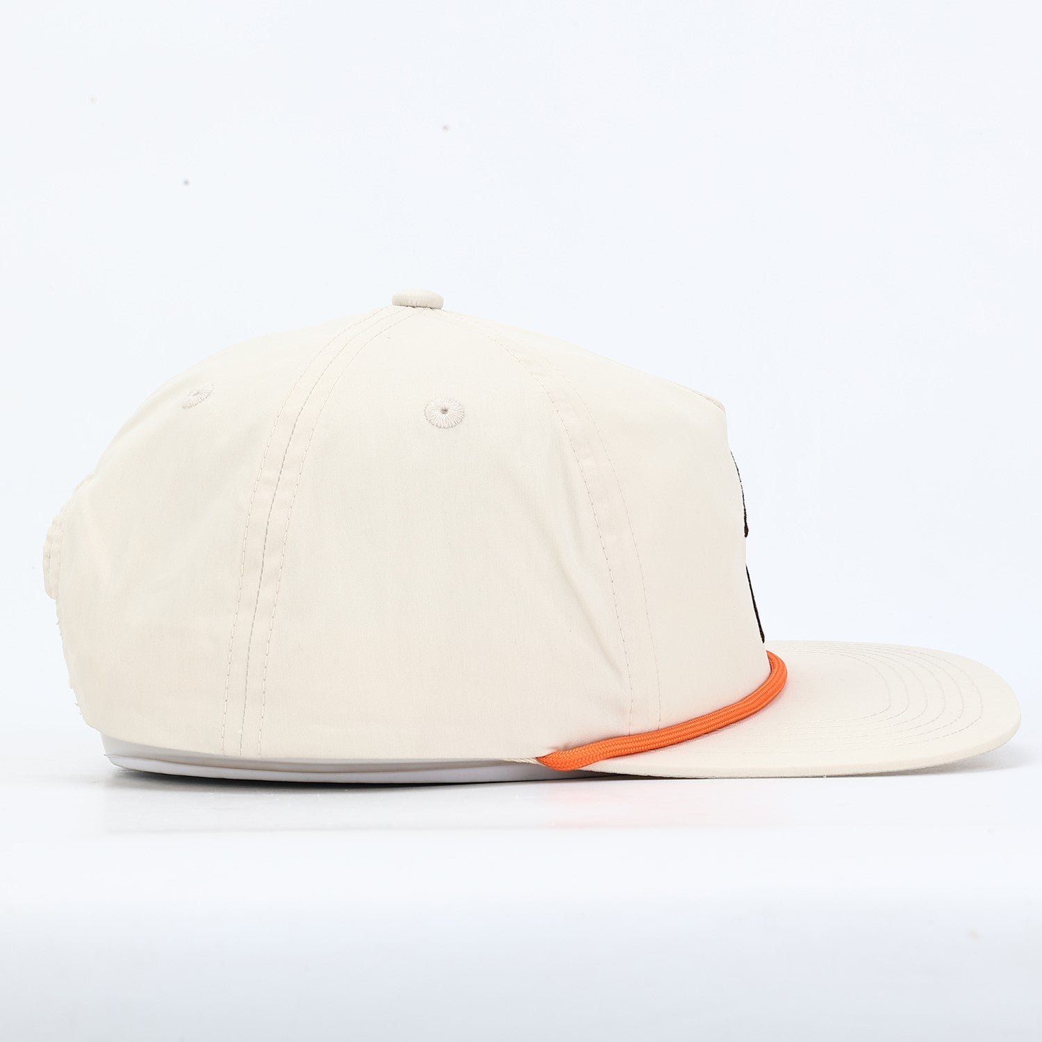 Beige cap with orange rim on a white background