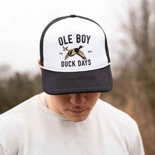 Person wearing a cap with 'Ole Boy' and 'Duck Days' text and logo.