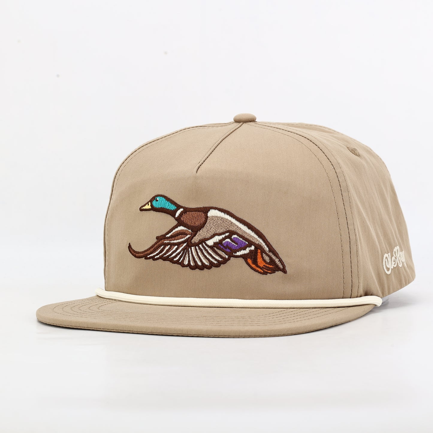 Beige cap with a duck embroidered on it against a white background