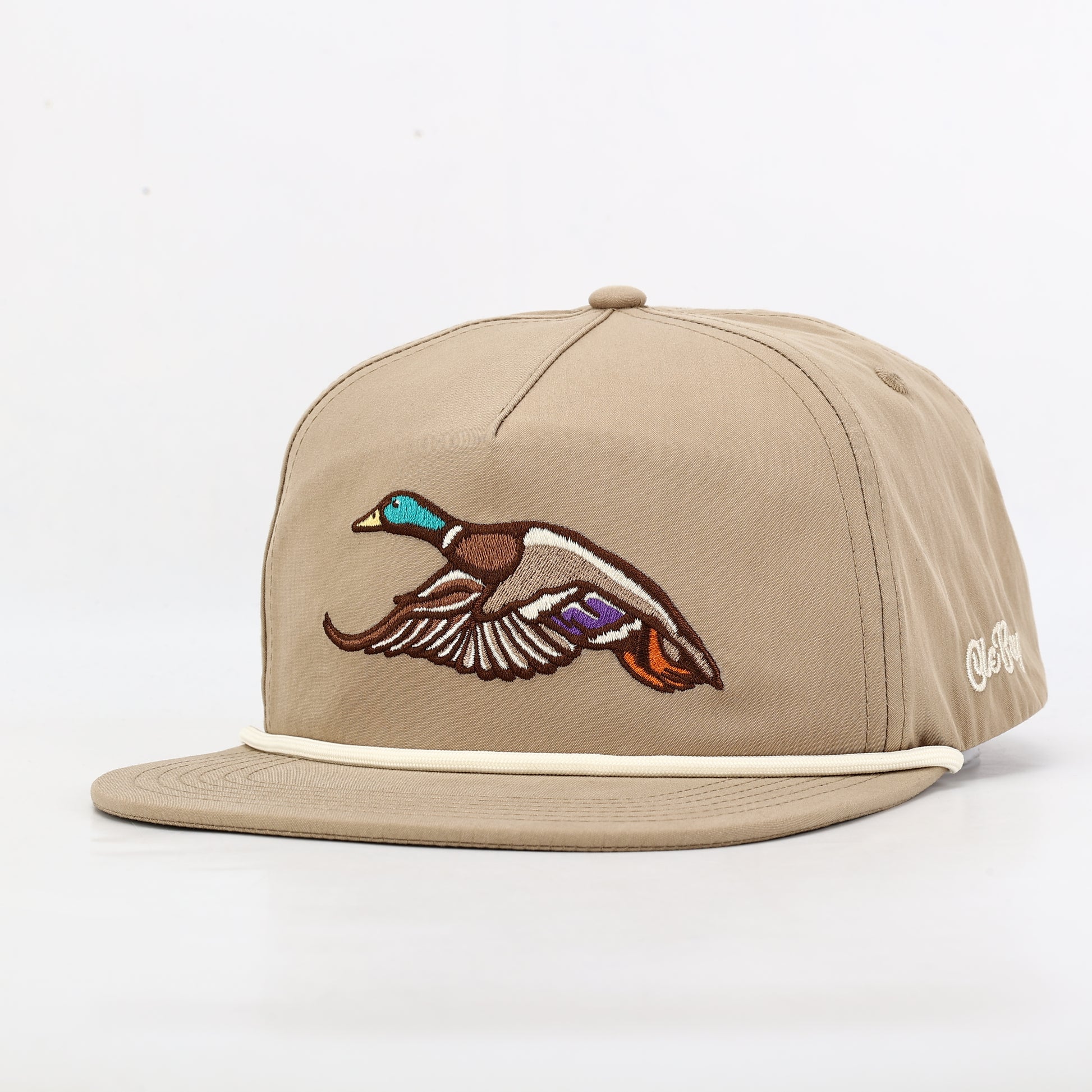 Beige cap with a duck embroidered on it against a white background
