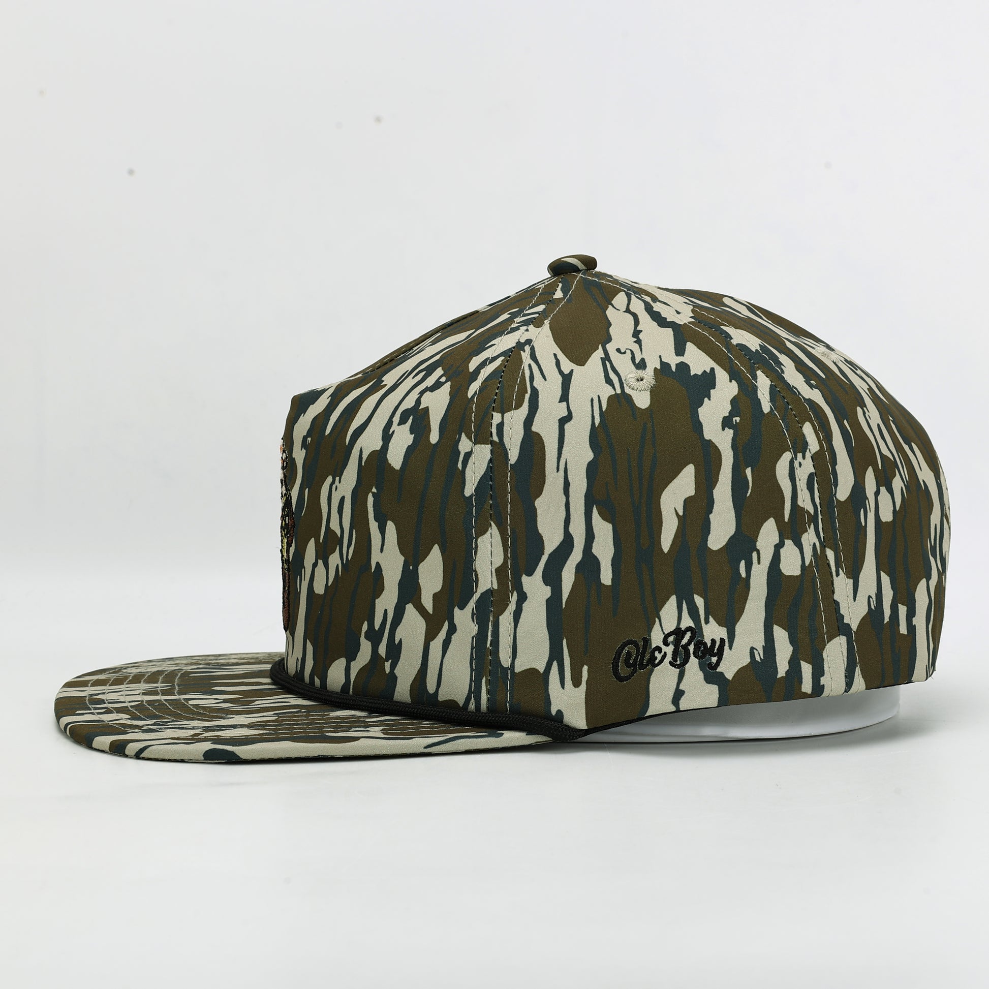 Camouflage-patterned cap with a brand logo on a white background