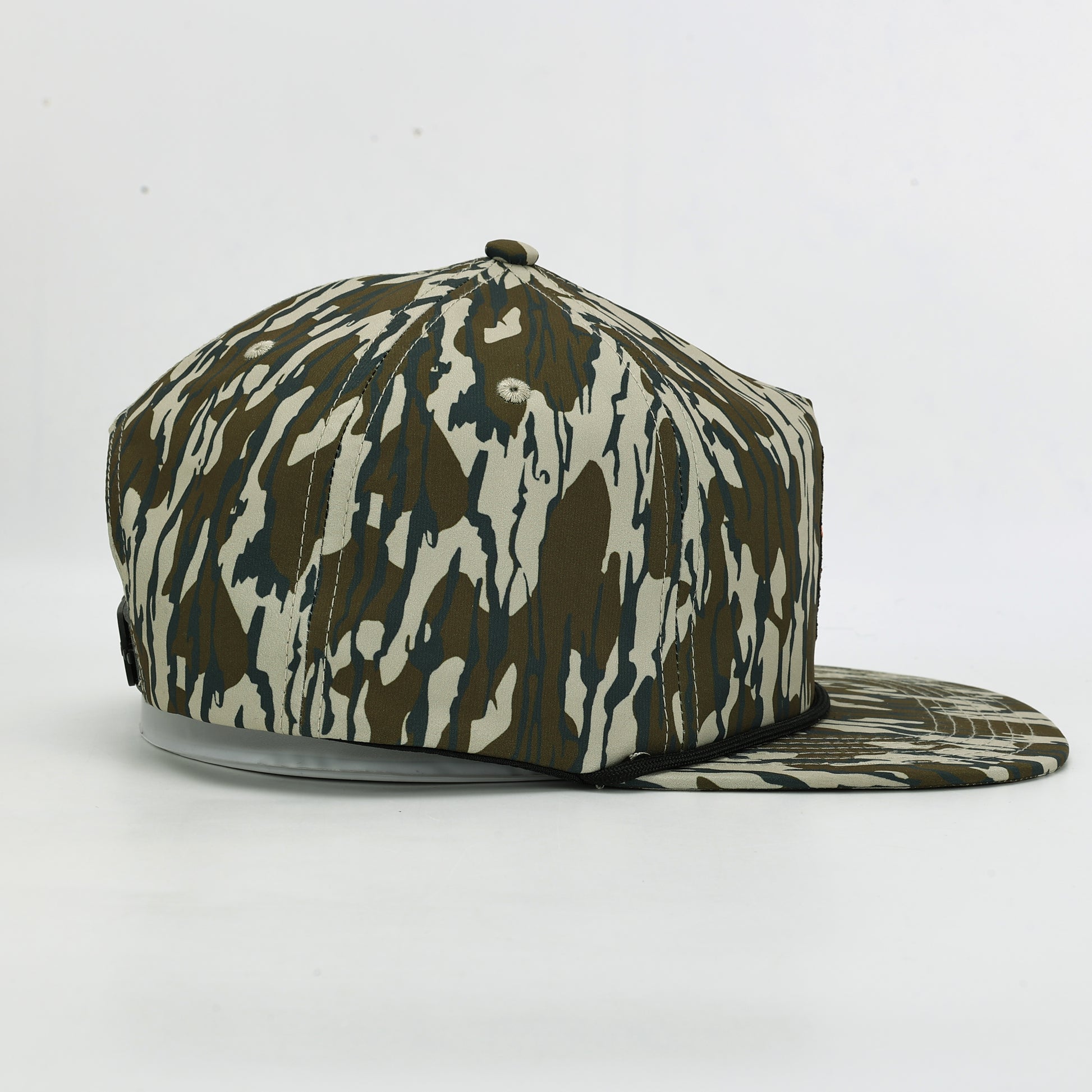 Camouflage-patterned cap on a white background