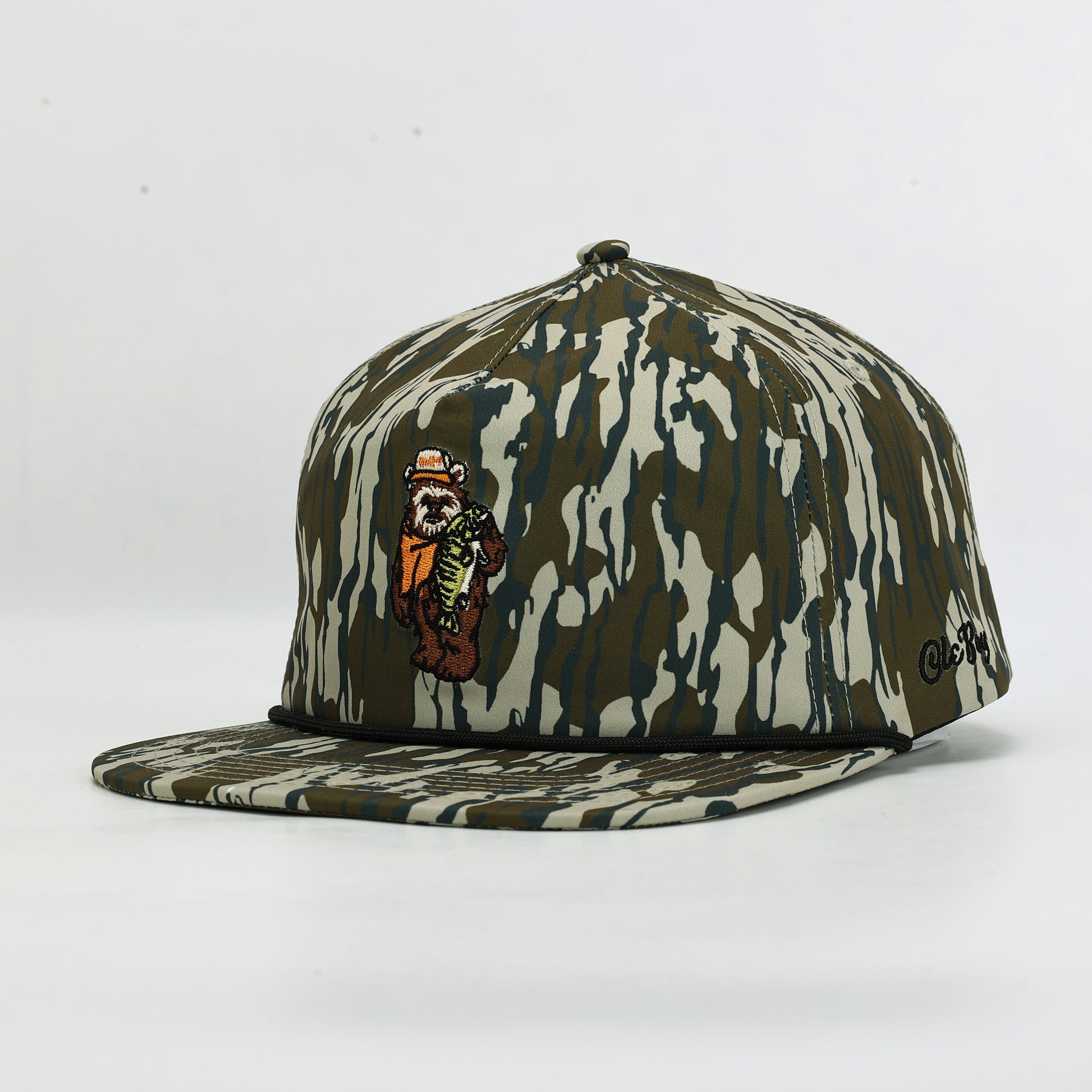 Camouflage-patterned cap with a bear design on a white background